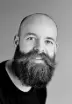 grayscale photography of man wearing crew-neck shirt